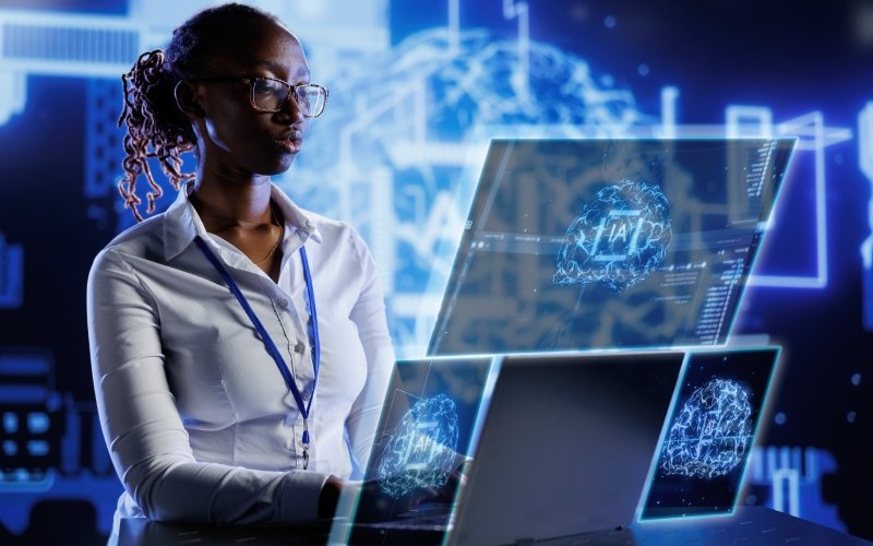 multiethnic women game designer looking at compute 1 1.jpg